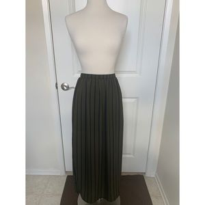 Olive green maxi skirt with side slits.